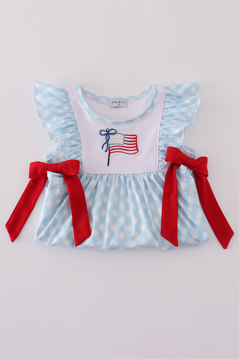 Blue gingham ruffle shorts set with flag embroidery and a matching bow.