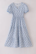 Blue toile garden bow mom tiered dress with a charming floral pattern.