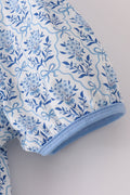 Blue toile garden bow mom tiered dress with a charming floral pattern.