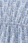 Blue toile garden bow mom tiered dress with a charming floral pattern.