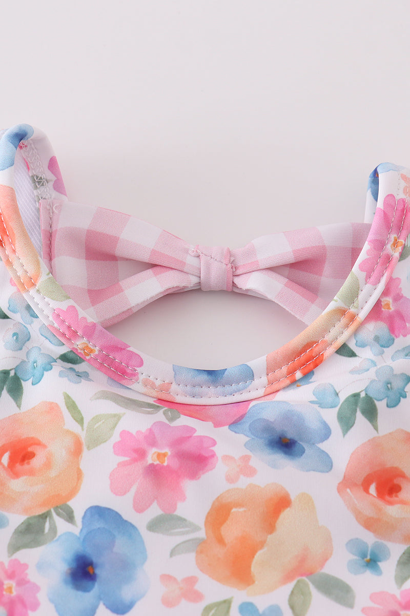Pink watercolor floral 2-piece swimsuit with ruffled straps, perfect for sunny days.