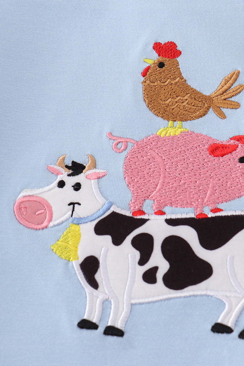 Blue farm-themed shorts set with playful applique designs, perfect for summer fun.