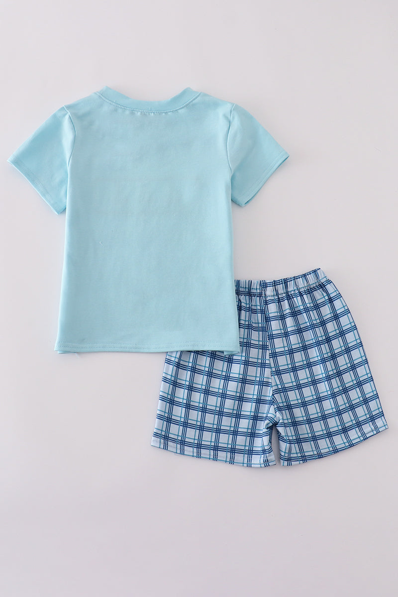 Toddler shorts set with blue sailboats embroidery and smocked detailing, perfect for summer.