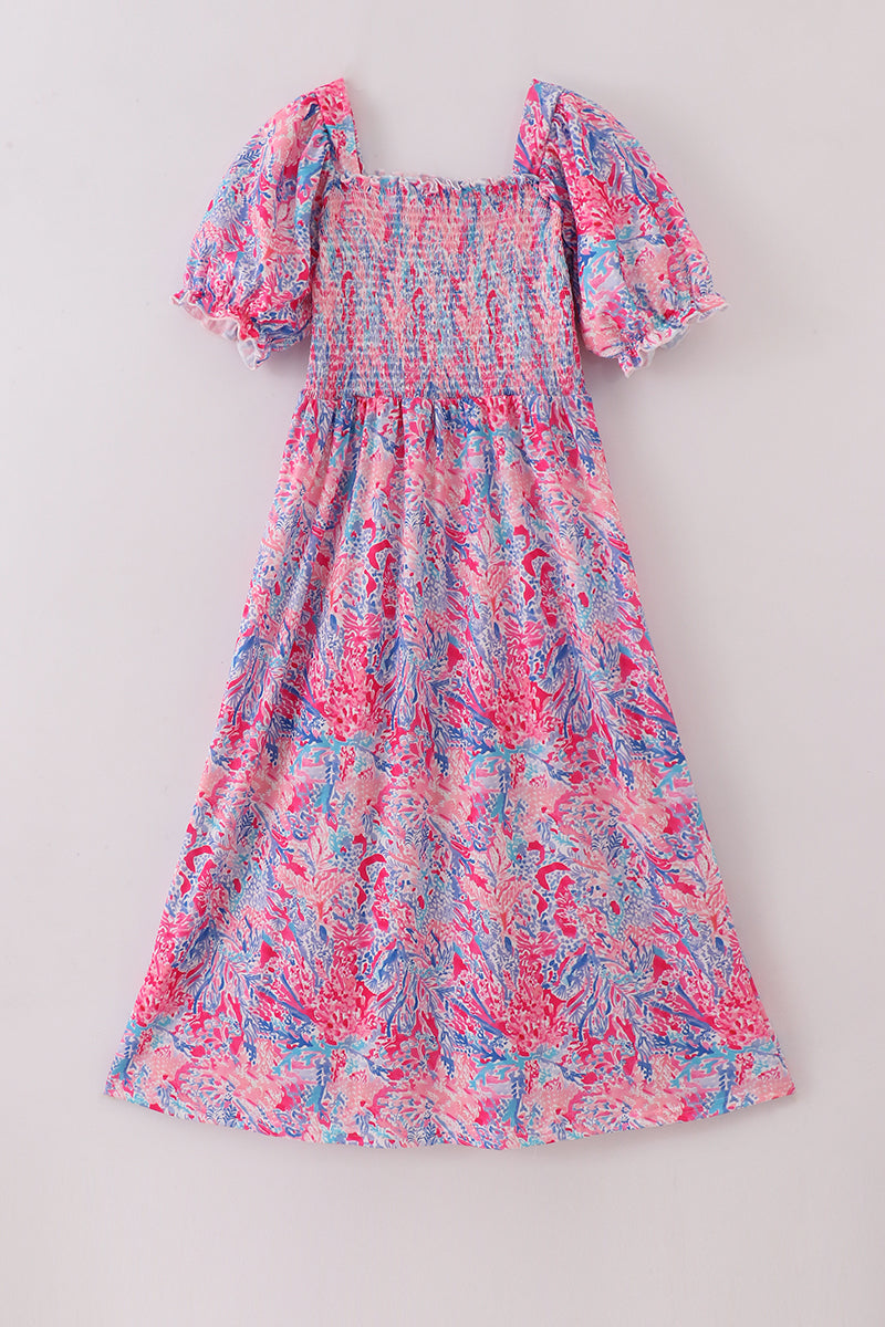 Pink coral reef patterned smocked ruffle dress, perfect for playful summer days.
