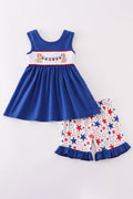 Adorable blue ruffle shorts set with puppy and star embroidery, perfect for playtime.