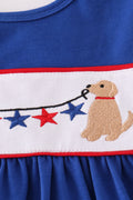 Adorable blue ruffle shorts set with puppy and star embroidery, perfect for playtime.