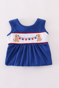 Adorable blue ruffle shorts set with puppy and star embroidery, perfect for playtime.