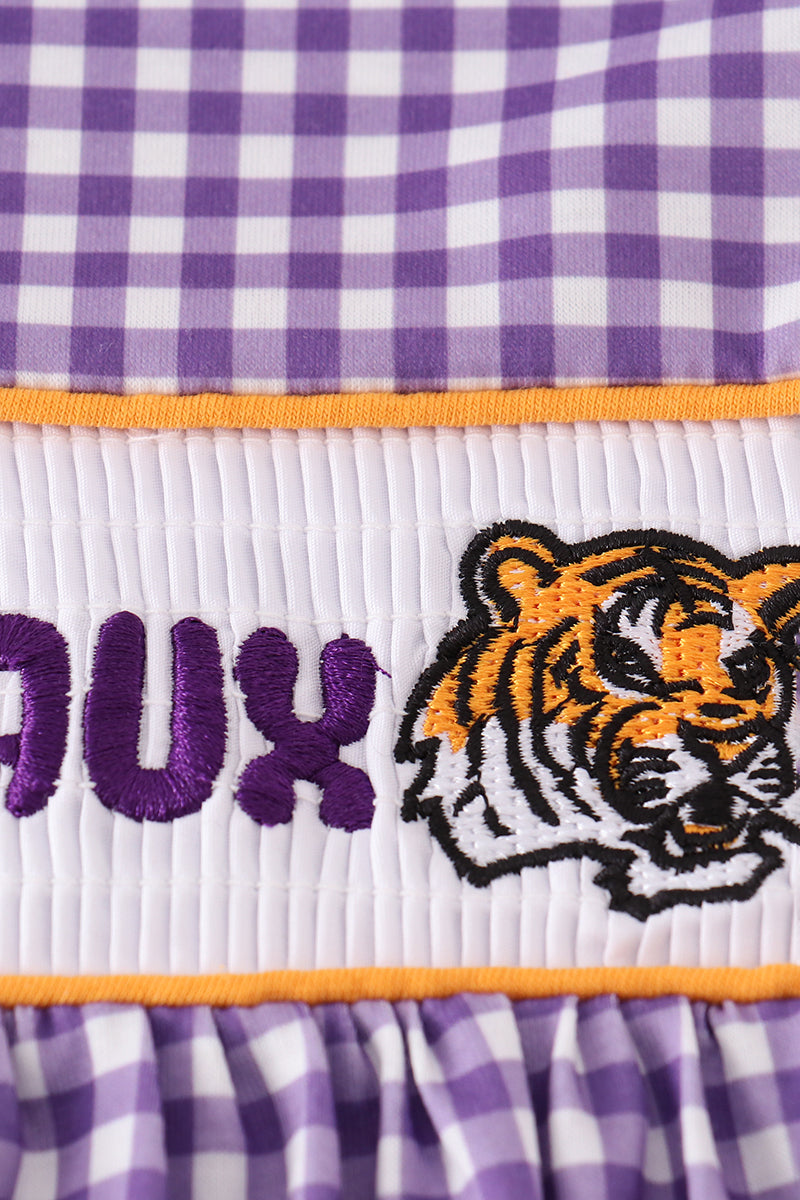 Purple smocked dress with gold LSU geaux embroidery, perfect for game day.