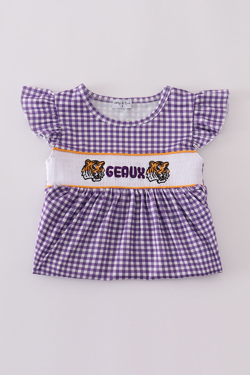 Purple smocked dress with gold LSU geaux embroidery, perfect for game day.