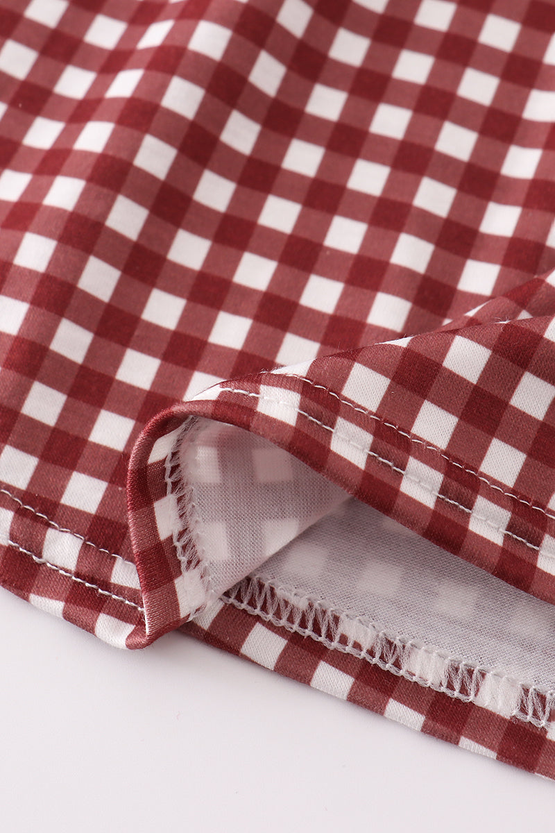 A charming gingham dress with MSU embroidery, perfect for game day.