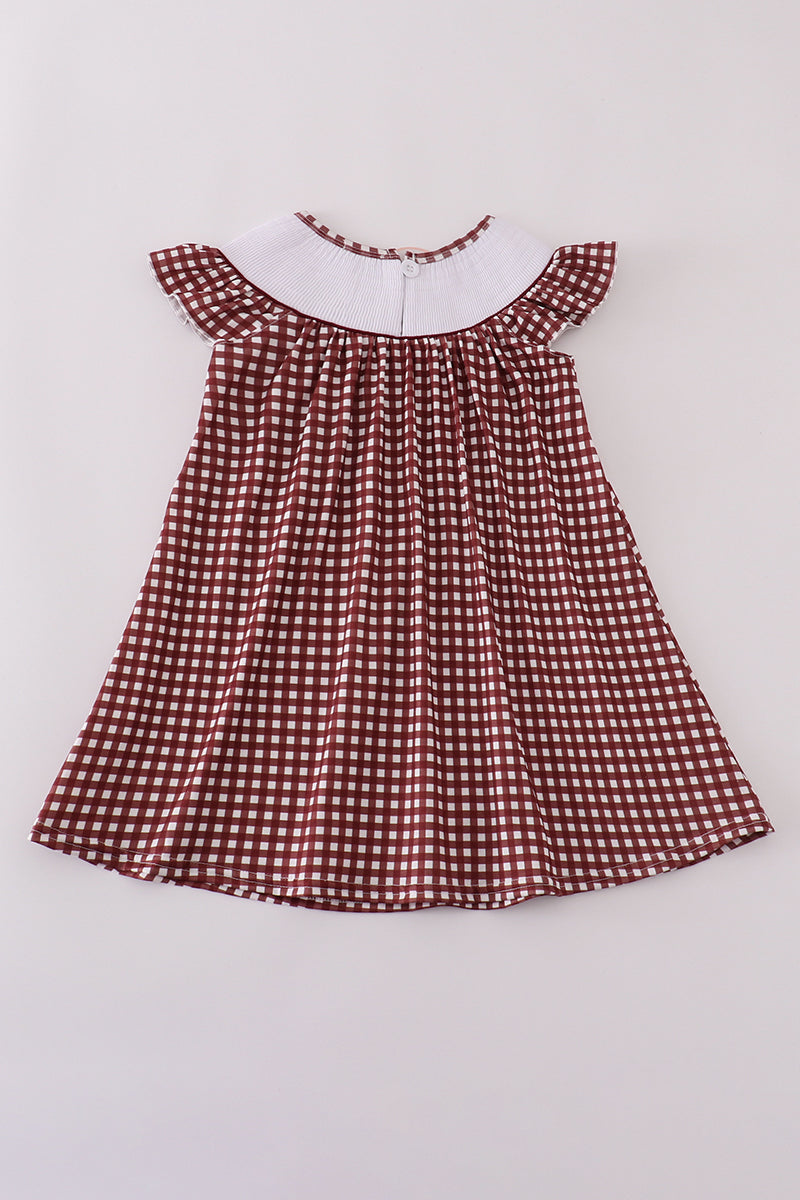 A charming gingham dress with MSU embroidery, perfect for game day.