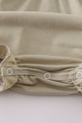 Green ruffle bubble with farm windmill embroidery, perfect for playful adventures.
