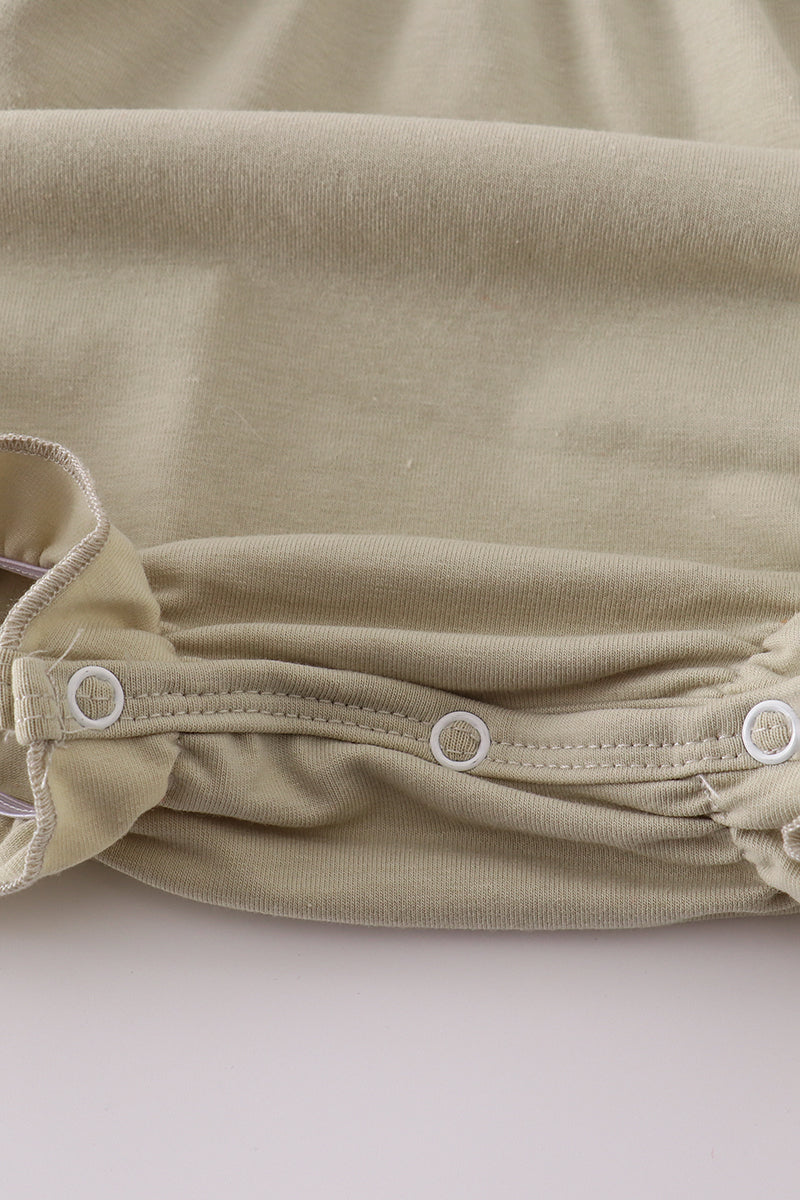 Green ruffle bubble with farm windmill embroidery, perfect for playful adventures.