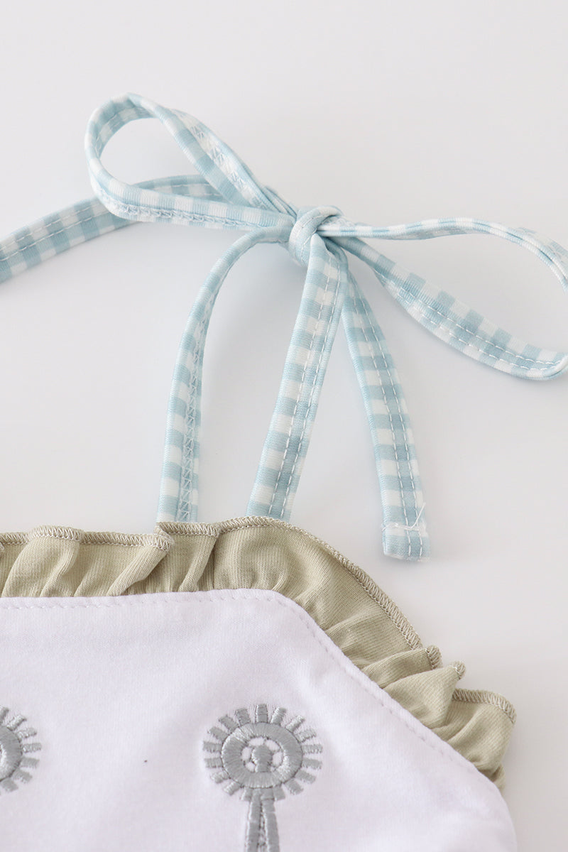 Green farm-themed shorts set with windmill embroidery and playful ruffle details.