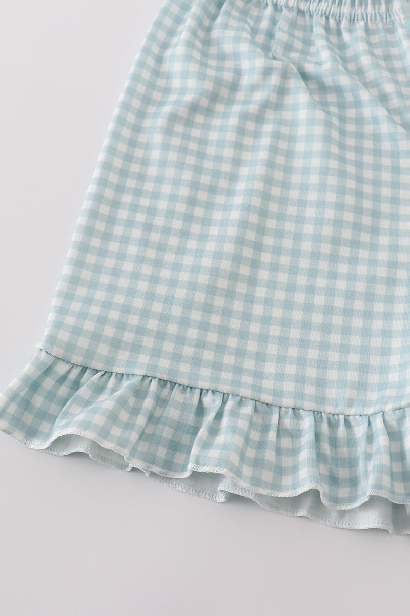 Green farm-themed shorts set with windmill embroidery and playful ruffle details.