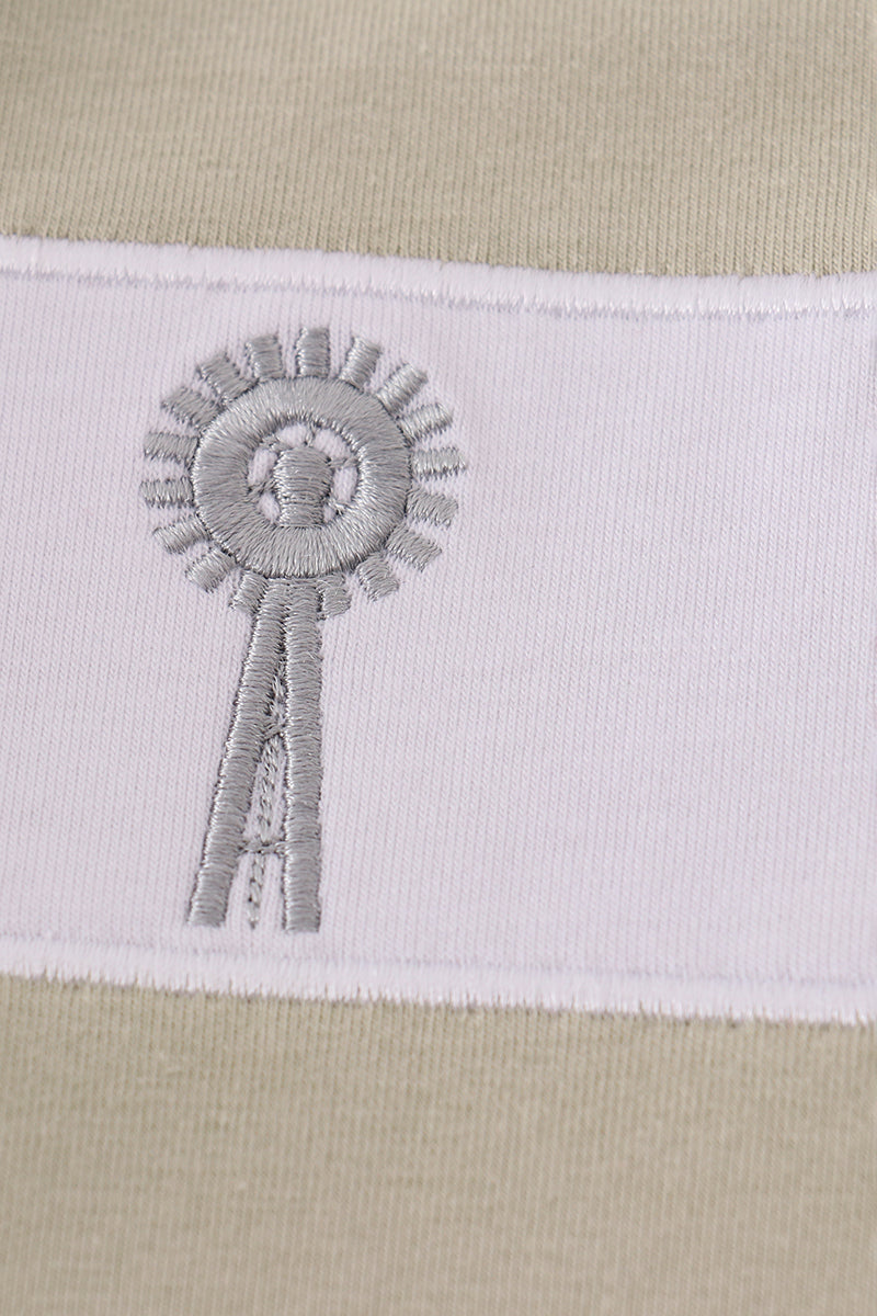 Green farm windmill embroidery shorts set with playful farm-themed design.